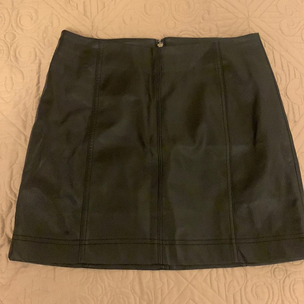 Black skirt. “Wild Fable”